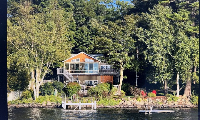 Manchester House | Dog-Friendly Lakeside Retreat with Hot Tub & Spa Amenities