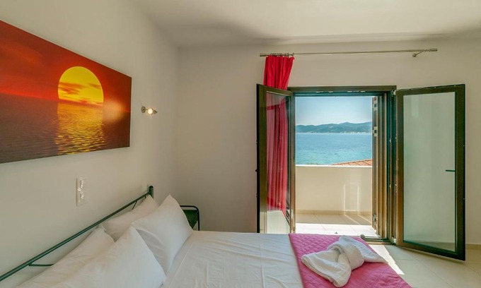 Agii Apostoli House | Explore Spela House: Oceanfront Retreat with Kids' Amenities