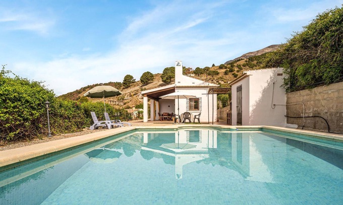 Sedella House | Spend the vacation in this inviting cottage in a beautiful location.