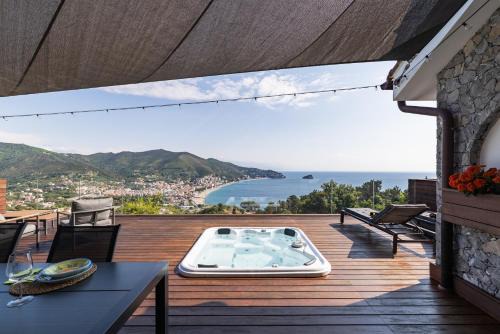 Noli House | Gorgeous Island Views with Hot Tub & Child-Friendly Amenities