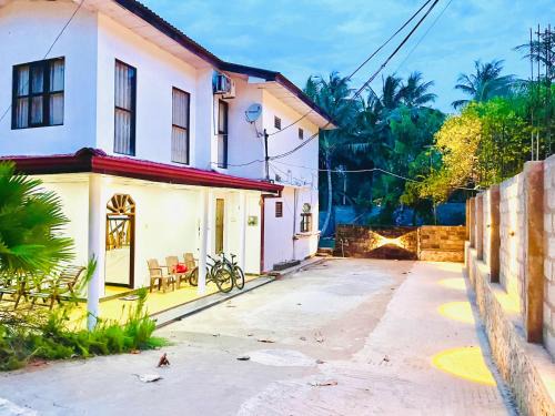 Udawalawa House | Scenic Lake View Safari Lodge with Spa & Family Amenities