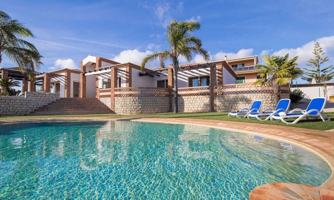 Ameijeira Villa | Oceanfront Apartment with Pool, Tennis & Pet-Friendly Amenities