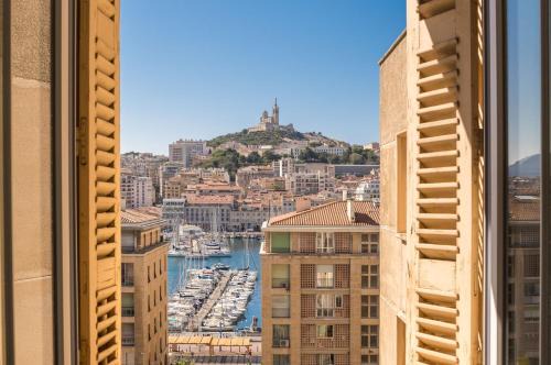 Hotel-de-Ville Apartment | Magnificent Views of ND de la Garde & Vieux Port Await