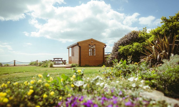 Pevensey Apartment | Scenic Beach Garden Apartment with Sea Views & Private Oasis