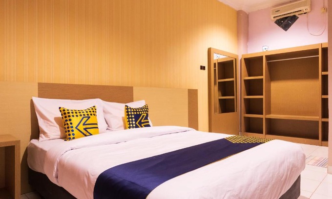 Kupang Hotel | Budget-Friendly Stay at SPOT ON 2318 Citra Palm Residence