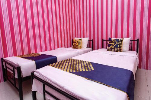 Cilacap Hotel | Budget-Friendly Stay at SPOT ON 2875 Kost Pandawa Syariah