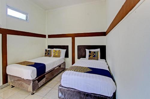 Purwokerto Hotel | Budget-Friendly Stay at SPOT ON 93557 Juan Kostel 2