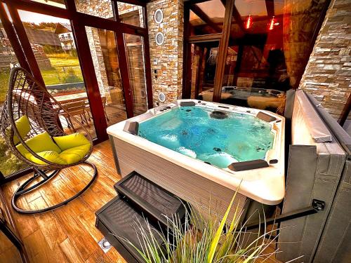 Zdiar House | Relax at Spring Chalet: 4-Star Retreat with Spa & Hot Tub