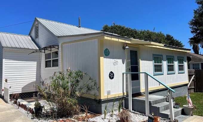 Gulfport Cottage | Beach-Ready Getaway: King Bed, Fire Pit & Hammocks Await