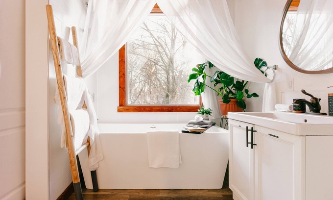 East Hill Condo | Delightful Retreat: Pet-Friendly with Private Deck & Tub
