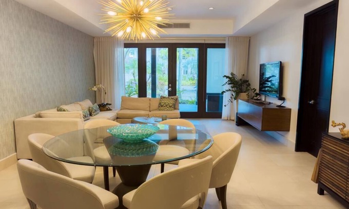 Herreras Condo | Elegant Villa Steps from Bahia Beach with Oceanfront Bliss