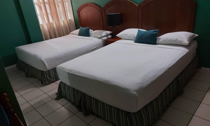 Buccoo Hotel | Cozy Standard Room B at Bellissimo with Breakfast Included