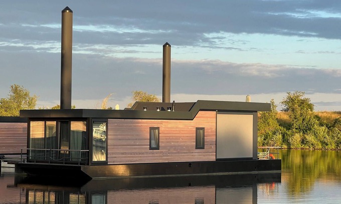 Ohe en Laak Boat Rental | Experience Waterfront Living with Spa and Breakfast Options