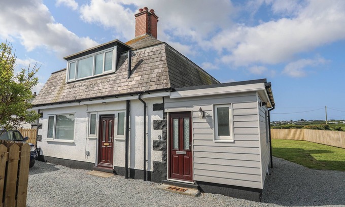 Llanfaelog House | Pet-Friendly Station House Cottage with Ocean Views in Rhosneigr