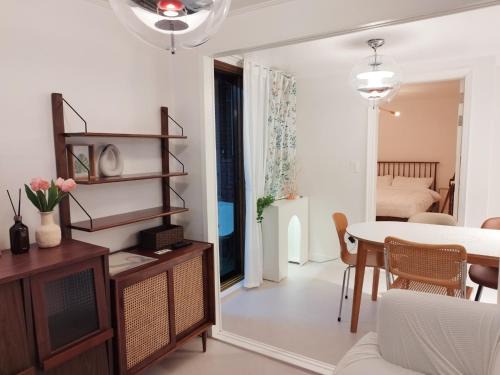 Mapo Apartment | Guest Rated 9.3: Stay Jung with Family-Friendly Amenities