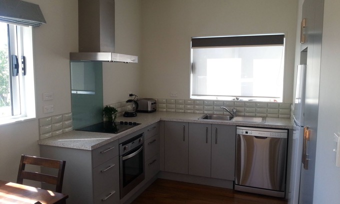 Paraparaumu Beach Cottage | Relax and Enjoy: Family-Friendly Stay with Pool Access