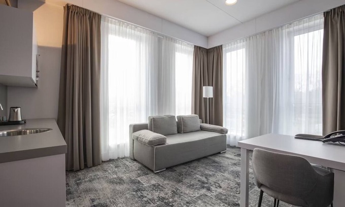 Oss Hotel | Stay Steps from Nature with Bike Rentals, Hiking Trails, and Free Parking