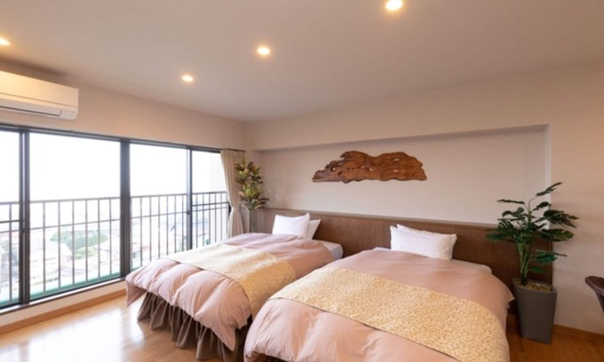 Beppu Hotel | Relaxing Twin Room with Open-Air Bath in Beppu Ōita