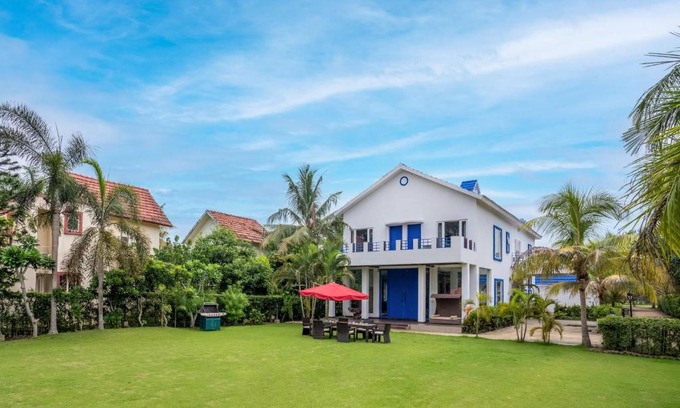 Howrah Villa | Elegant Poolside Villa with Lawn & Terrace - StayVista