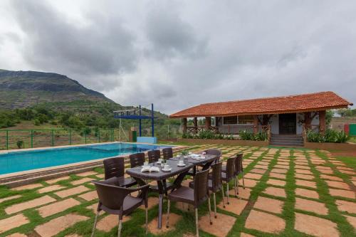 Igatpuri Villa | Relax at StayVista's Ficus Farms - Mountain Views & Pool