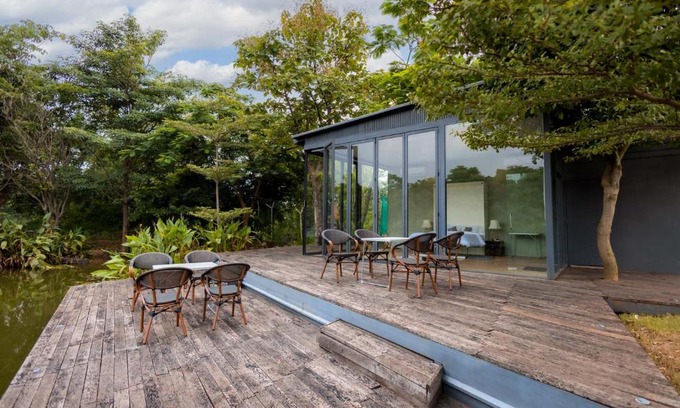 Indore Villa | Relax at Water Song Garden: Lake-Side Villa with Games
