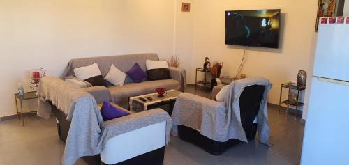 Livadia Apartment | Relax at Sioukris Court: Oceanfront Views & Great Amenities