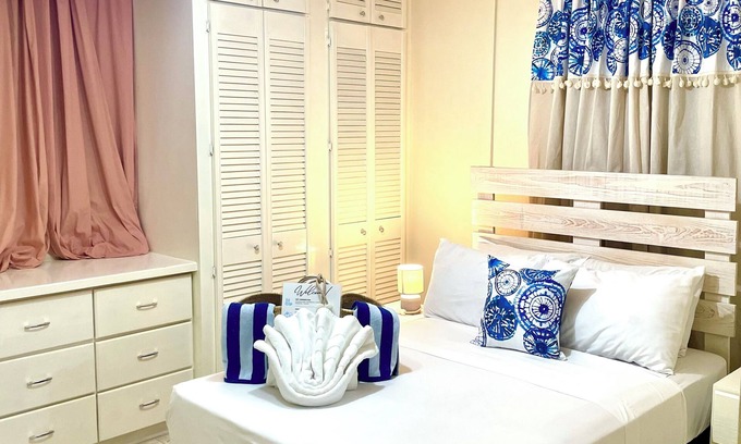 Graeme Hall Terrace House | Ideal Family Getaway: Steps 2 Beach with Spa & Hot Tub