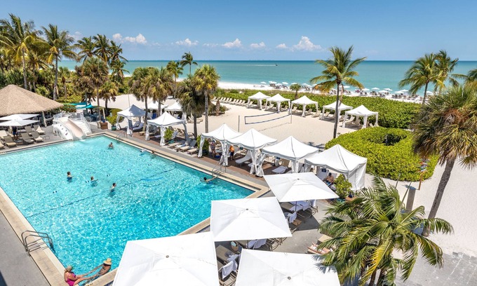 Sanibel House | Steps to Sanibel Beach with Pools, Hot Tub, Tennis & Dining — Ideal Island Stay