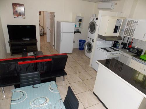 Trincity Apartment | Stewart Apt: Ideal for Families with Office & WiFi Access