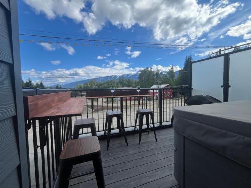 Revelstoke Apartment | Tranquil Stokeside Serenity with Hot Tub & Perfect Reviews