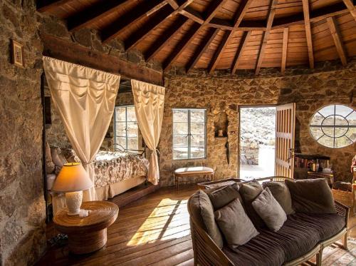 Araby Cove House | Stone-Built Bungalow Rental with Coachella Valley Views near Palm Springs, California