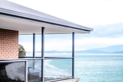 Primrose Sands House | Discover Stones Throw: Oceanfront Escape with Hot Tub