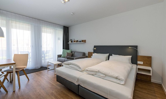 Bensersiel Apartment | Oceanfront 1-Bedroom Apartment with Balcony & Pool Access