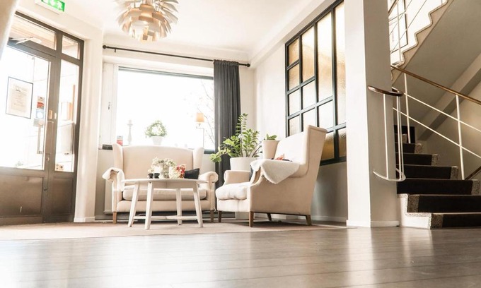Vanersborg Hotel | Relax at Strand Hotell: Pet-Friendly with Restaurant & Breakfast