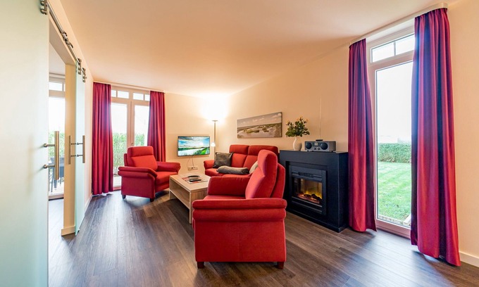 Wremen Apartment | Seaside Retreat: Beautiful Apartment with Sauna & Terrace