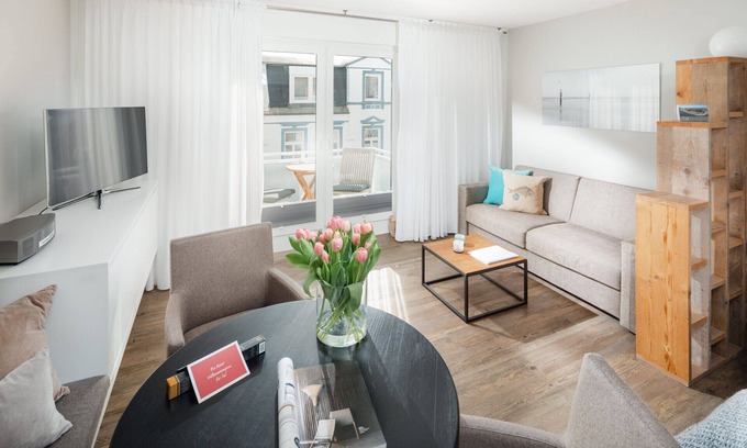 Norderney Apartment | Experience Strandzeit 13: Oceanfront Bliss Awaits You