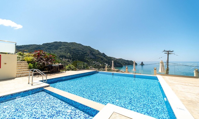 Agios Gordios Apartment | Cozy Mazis Studio B2 with Sea View, Balcony & Wi-Fi