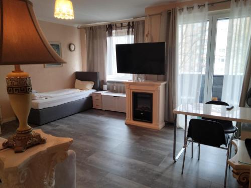 Neumuenster Apartment | Bright Studio Apartment with Balcony & Hot Tub Amenities