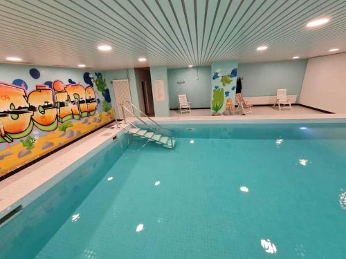 Morgins Apartment | Cozy Studio with Pool & PS3 Games in Morgins