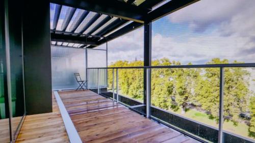 Neudorf Ouest Apartment | Stylish Studio with Terrace at DOCKS - Rated 8.7/10