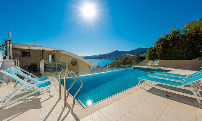 Palaio Tsifliki Apartment | Gorgeous Studio Evian: Oceanfront Pool & Hot Tub Retreat