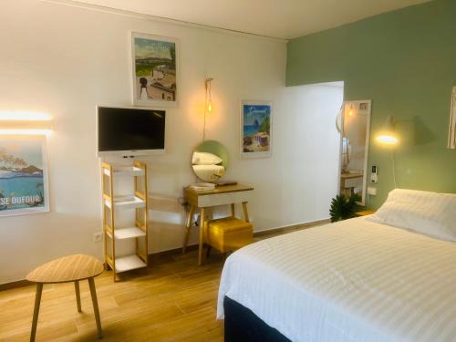 Pointe du Bout Apartment | Cozy Oceanfront Studio at Hotel Carayou - 4 Stars, Rated 9.5