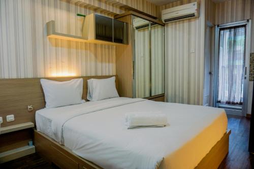 Pluit Apartment | Cozy Green Bay Pluit Apartment for a Comfortable Stay