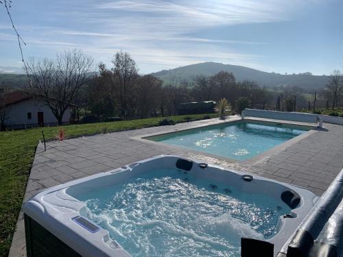 Macaye Apartment | Relax at Studio Laina with Spa Access & Top Amenities