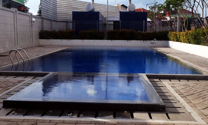 Kayu Putih Apartment | Convenient Studio Steps from Bella Terra Mall & Pool Access