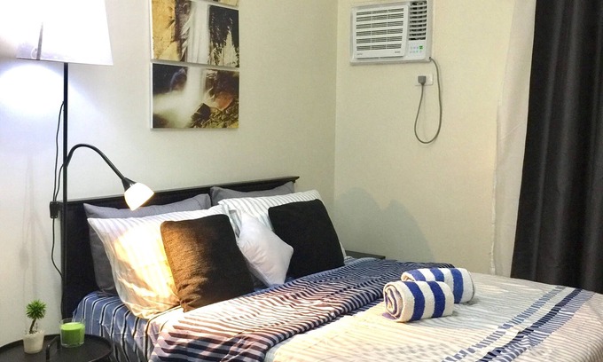 Phil-Am Apartment | Convenient Studio Near Malls & MRT with WiFi and Netflix
