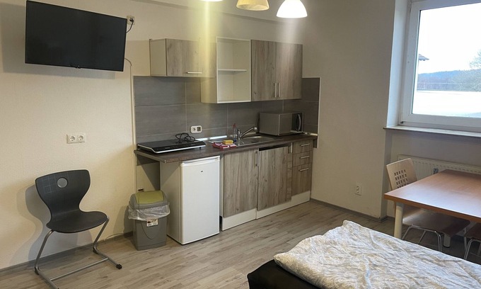 Wolfsanger Apartment | Cozy Studio with Private Bathroom & Family-Friendly Amenities