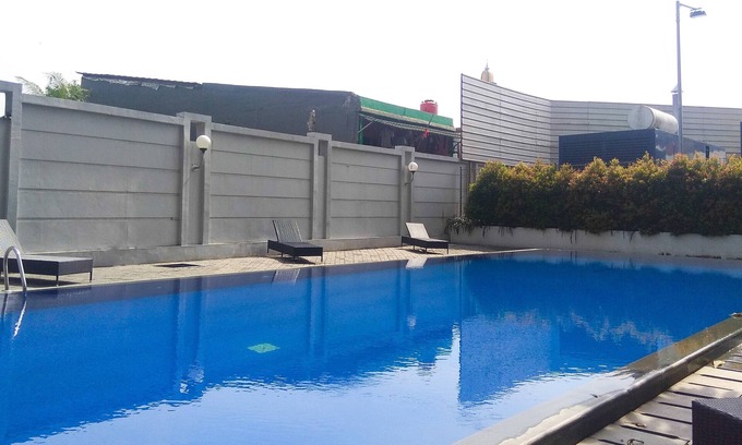 Kayu Putih Apartment | Cozy Studio Room at Tifolia Apartment, Pool & Kitchen Access
