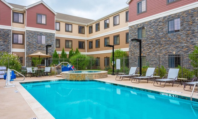 Independence Apartment | Business-Ready Studio Suite with Pool & Spa Access