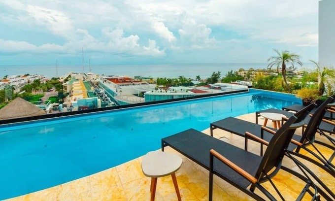 12th Street Apartment | Stylish Studio with AC, Kitchen, Pool & Rooftop View